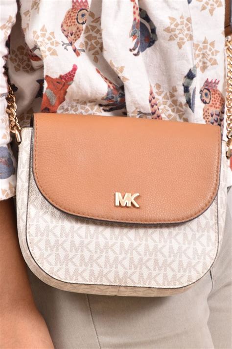 pink michael michael kors mott logo dome crossbody|Mott Logo Dome Crossbody .